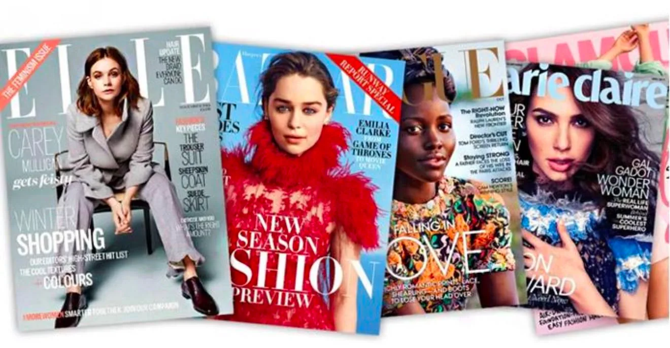 Magazine covers fanned across a table, among them ELLE and Marie Claire.